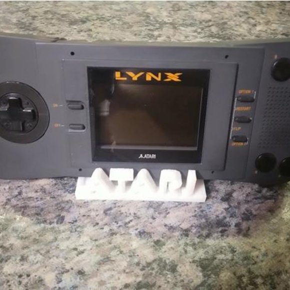 Atari Lynx Handheld Console Stand Retro Charger Station Vintage Portable Cradle - Picture 1 of 2